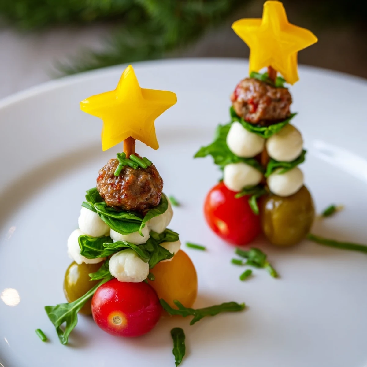 Imagine the savory Mini Meatball Christmas Trees: golden meatballs, vibrant tomatoes, and fresh basil, so appealing.