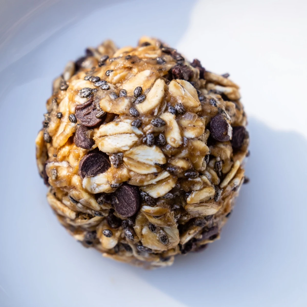 These Almond-Chia Energy Bites are rolled into perfect spheres, ready for a healthy snack or treat.