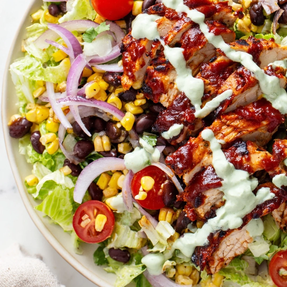 BBQ chicken salad, bursting with smoky grilled flavors, is a perfect, hearty and fresh meal to enjoy.