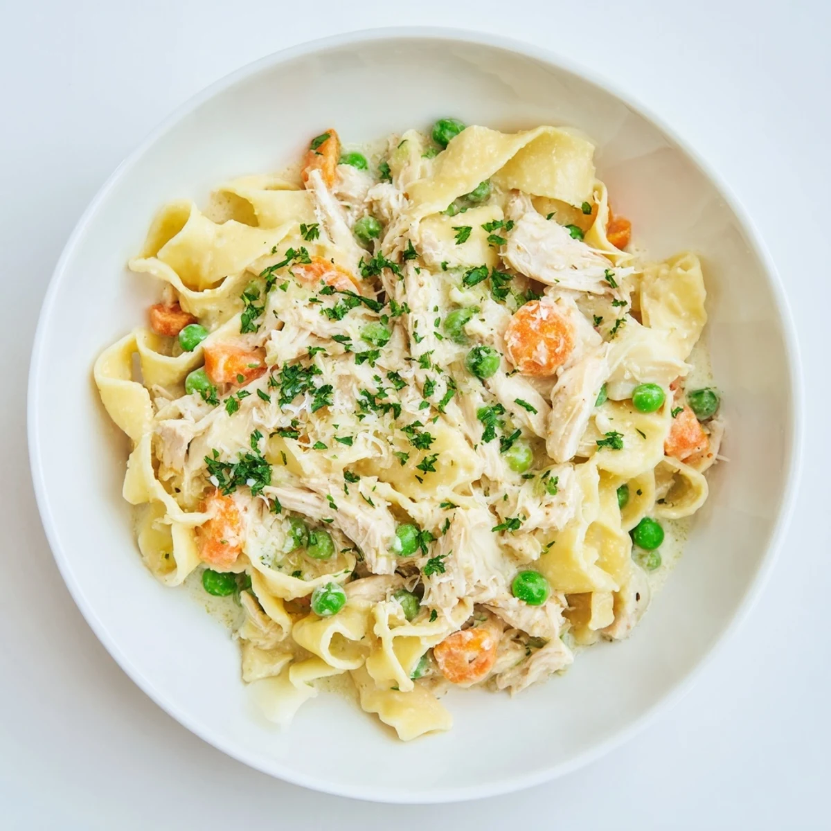 Golden-hued Spring Chicken Noodle Skillet, a comforting and creamy dish ready for serving.
