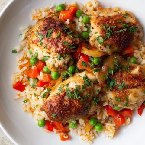 Tender Smoked Paprika Chicken and Rice Casserole, a family-friendly, comforting baked dinner.