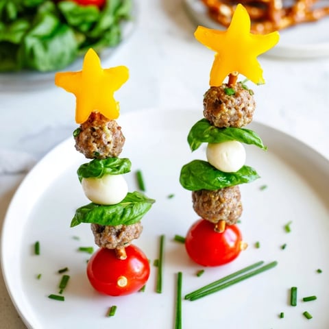 Festive Savory Bites: Mini Meatball Christmas Trees, delicious bite-sized holiday appetizers ready to serve.