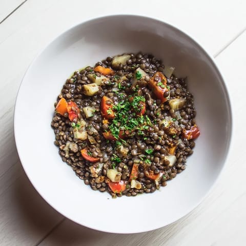 Guiso de lentejas y ciruelas