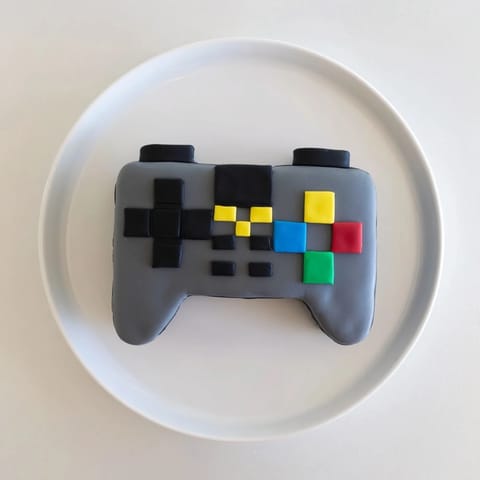 A pixel-perfect video game controller cake, a vibrant dessert imagined for gamers to enjoy.