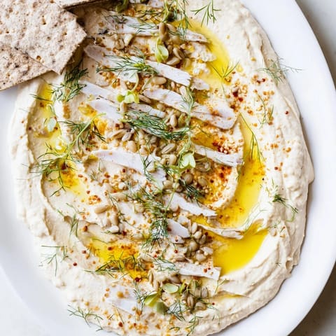 Delicious The Driftwood Beach appetizer: Hummus "sand," smoked fish "driftwood" and crackers, fresh.