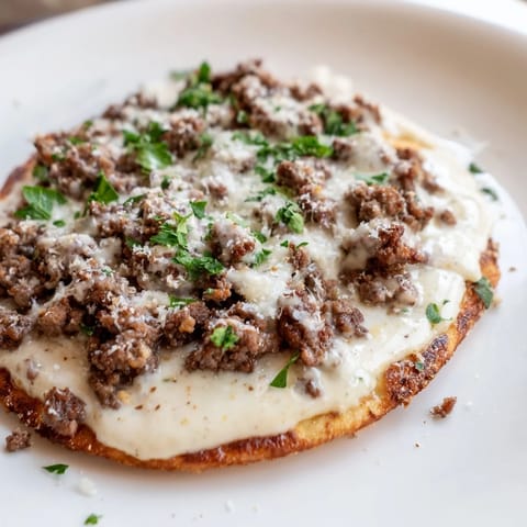 Pizza con carne y Alfredo