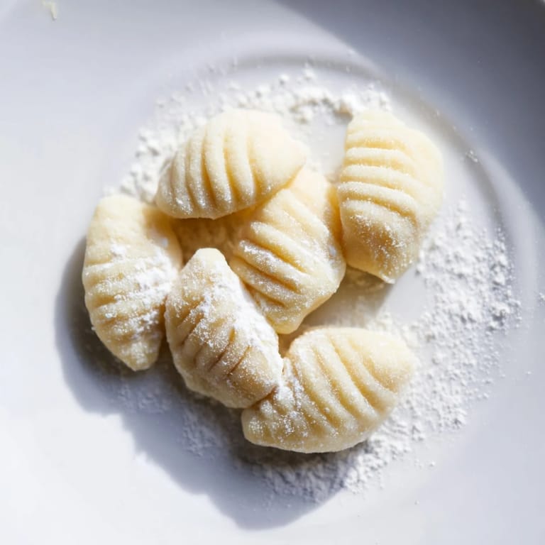 Perfect homemade potato gnocchi, a comforting Italian pasta dish, waiting for sauce.