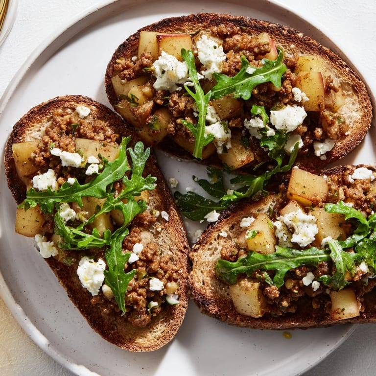 Warm, flavorful Lightened Morcilla Tartine ready to savor with a dry cider pairing.