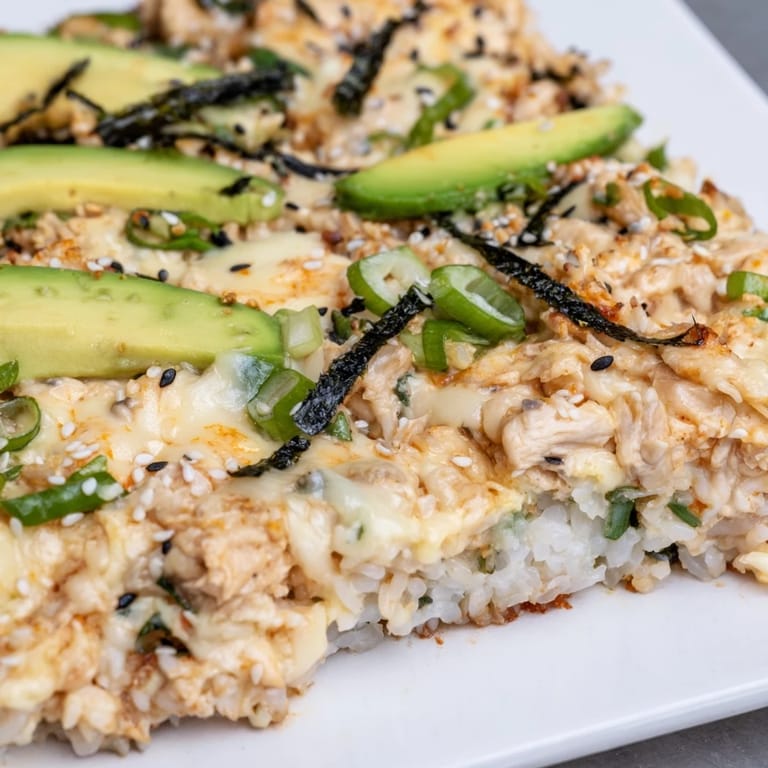 Enjoy a close-up of this delicious Chicken Sushi Bake, perfect for dinner parties and easy to assemble.